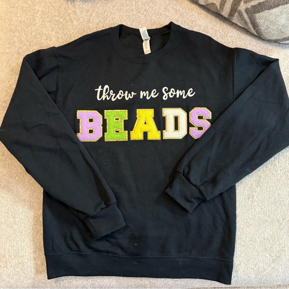 Black Mardi Gras Sweatshirt with Colorful 'Throw Me Some Beads' Design